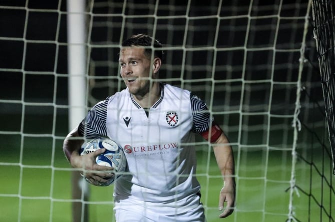 St Austell skipper Neil Slateford, pictured scoring at home recently, added the third goal at Nailsea and Tickenham. Picture: Paul Williams