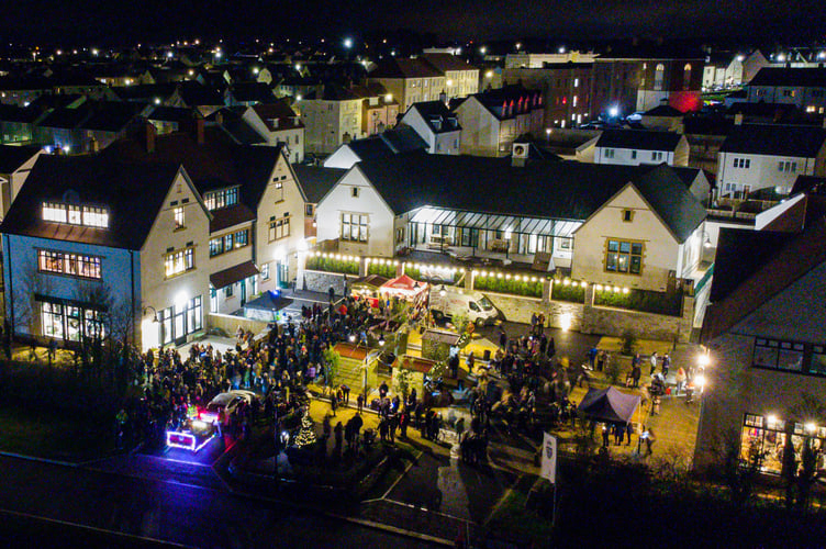 NANSLEDAN, NEWQUAY : December 15 2023 : Christmas Market night featuring seasonal stalls in Kew An Lergh and a visit from Santa Claus, photographed by Hugh Hastings for the Duchy of Cornwall.