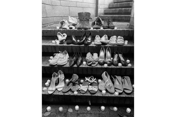 A poster depicting 19 pairs of shoes 