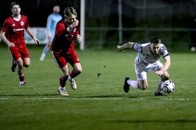 St Austell's Kieron Bishop (white), pictured during last week's Les Phillips Cup tie with Barnstaple Town, will be a key man going forward. Picture: Paul Williams