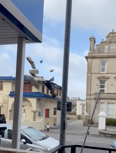 Man has lucky escape after part of restaurant roof blown off