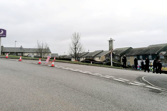 Police at the scene in Helston where the discovery of man's body in car has sparked a murder probe.  Release date  December 19, 2024.  Two women - including one in her 80s - have been arrested on suspicion of murder and concealing the body of a victim.  The suspects were detained after a murder probe was launched after the body of a man was found in a vehicle at the Helston Business Park in Cornwall.  Police were making enquiries in the Helston area in the early hours of Wednesday 18 December following concerns for welfare.  A man in his 60s, from the Somerset area, was confirmed dead at the scene. His next of kin have been informed.  Two women aged in their 50s and 80s, also from Somerset, have been arrested on suspicion of murder, concealing a death, and preventing a lawful burial. They remain in police custody at this time. 