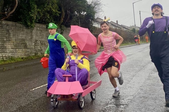 Runners taking part in the annual Saltash Pram Race