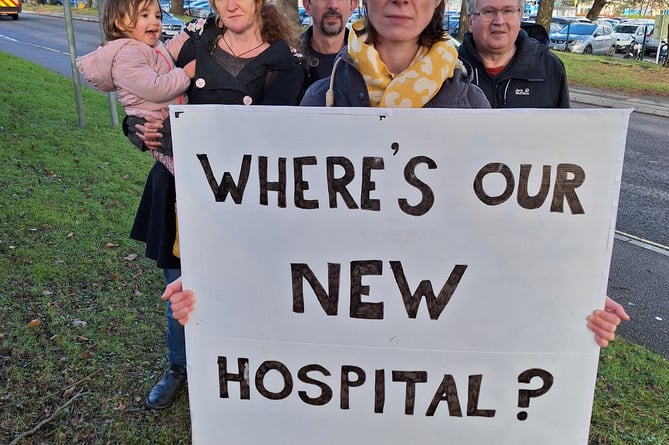 LibDem campaigners including Ruth Gripper (front) call for clarity over the new women's unit at Treliske