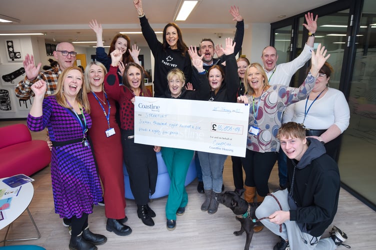 Coastline colleagues and clients gather with StreetVet CEO Zoe Abbotts, StreetVet Volunteer RVN Jayne James and celebrity partner Julia Bradbury to hand over their record-breaking fundraising amount.