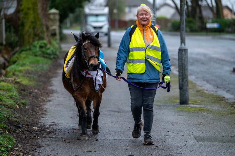 Carol Truscott and her horse 'Hope' out on their trek around St Austell showing their support for the people of Ukraine on the third anniversary of the war