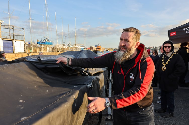 Julie Saville's fiance James Regler. Penzance & Newlyn Pilot Gig Club (PNPGC) held a ceremony to officially bless their new boat in memory of the clubâs founder Julie Saville on Saturday, 1 March, with the help of Rev. Rebecca Fugill, RNLI Penlee Lifeboat coxswain Patch Harvey, and Mayor of Penzance Stephen Reynolds. Photo by Penzance Council