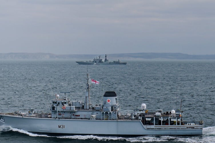 Picture shows Cattistock and Severomorsk 619 .      Royal Navy warships shadowed a Russian task group returning from Syria in UK waters. Type 23 frigate HMS Somerset, along with minehunter HMS Cattistock, RFA Tidesurge and Navy helicopters reported on every move as four Russian ships carried cargo back from the Eastern Mediterranean through the English Channel and the North Sea. The Russian ships included destroyer RFN Severomorsk, landing ship RFN Alexander Shabalin and two transport ships, MV Sparta IV and MV Siyanie Severa. HMS Somerset and her Merlin helicopter from 814 Naval Air Squadron began shadowing the Russian task group's escort, Severomorsk, south of Portsmouth on Sunday (March 16) after tanker Tidesurge had monitored the destroyer in the North Sea and through the Strait of Dover.